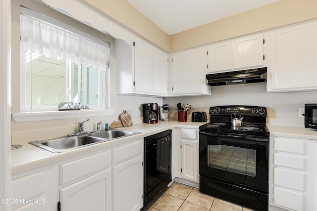 kitchen with light tile patterned flooring, sink, white cabinets, and black appliances