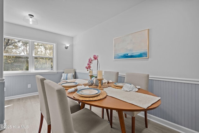 dining area with light hardwood / wood-style flooring