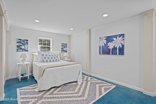 bedroom with ornamental molding and dark colored carpet