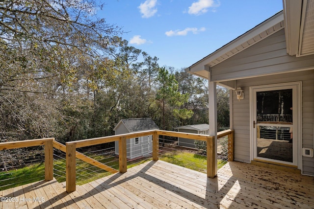 wooden terrace with a storage unit