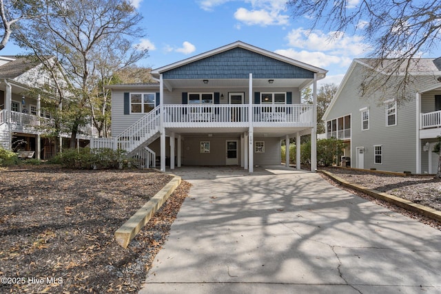 view of front facade with a carport and a porch