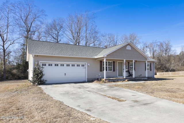 view of front facade with a porch and a garage