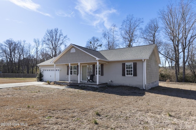 view of front of home featuring a garage and covered porch