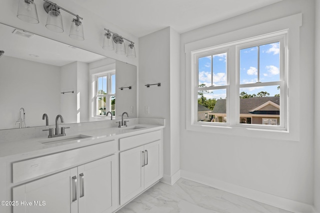 bathroom featuring vanity