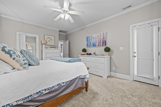 bedroom with ornamental molding, light colored carpet, and ceiling fan