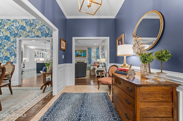 entrance foyer with plenty of natural light and ornamental molding