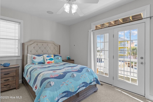 bedroom with ceiling fan, access to exterior, and carpet