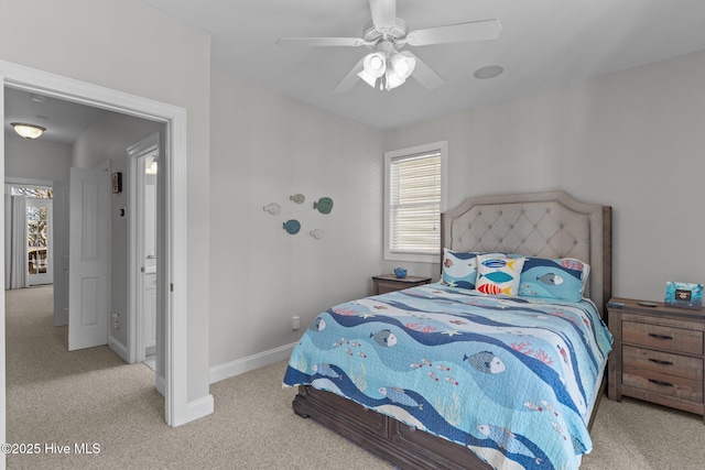 bedroom with light carpet and ceiling fan