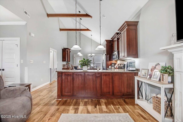 kitchen with range, high vaulted ceiling, decorative light fixtures, beamed ceiling, and light wood-type flooring