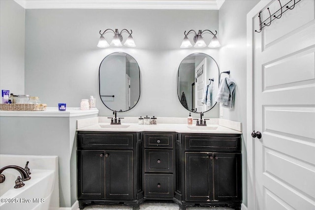 bathroom featuring vanity, a tub to relax in, and crown molding