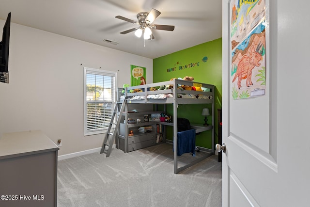 bedroom with light colored carpet and ceiling fan