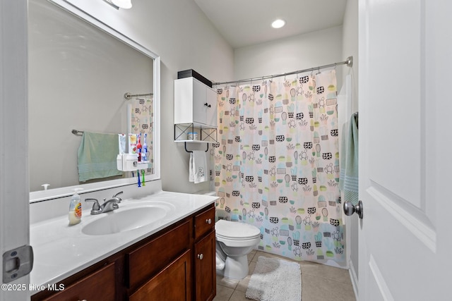 full bathroom featuring tile patterned flooring, vanity, shower / bath combination with curtain, and toilet