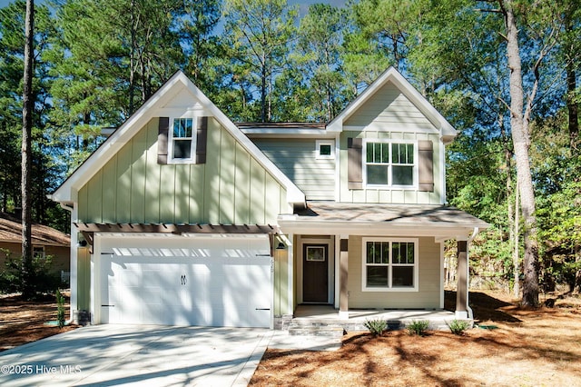 view of front of home featuring a garage and covered porch