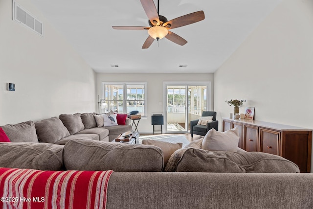 living room featuring ceiling fan