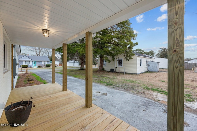 deck with an outbuilding