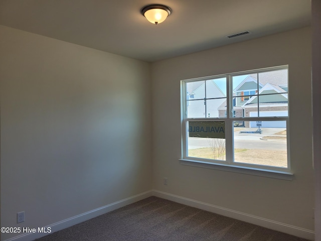 3709 W Cessna Way W Unit Ef 12, Wilson, NC 27896 - empty room with baseboards and dark carpet
