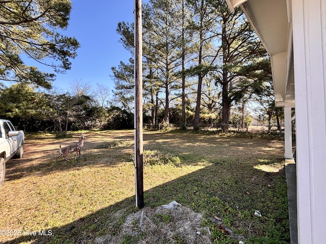 view of yard featuring fence