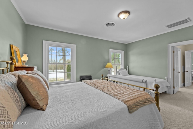 carpeted bedroom featuring ornamental molding