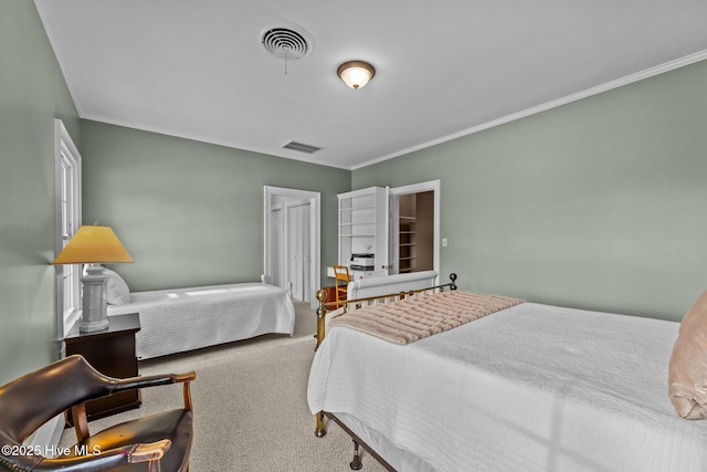 bedroom featuring crown molding and carpet