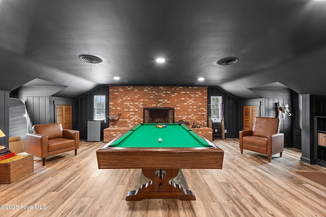 rec room with lofted ceiling, plenty of natural light, light wood-type flooring, and billiards