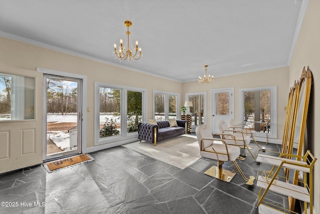 sunroom with a chandelier