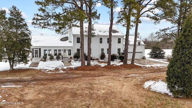 exterior space with a garage