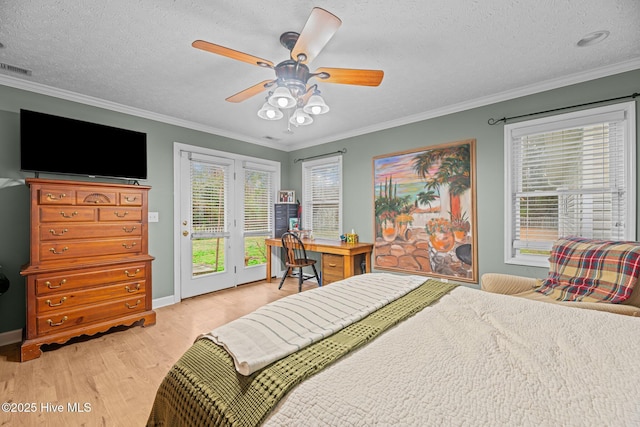 bedroom with crown molding, access to outside, a textured ceiling, and light hardwood / wood-style flooring