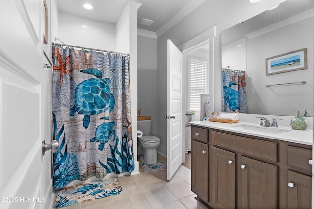 bathroom featuring vanity, a shower with shower curtain, tile patterned floors, and toilet