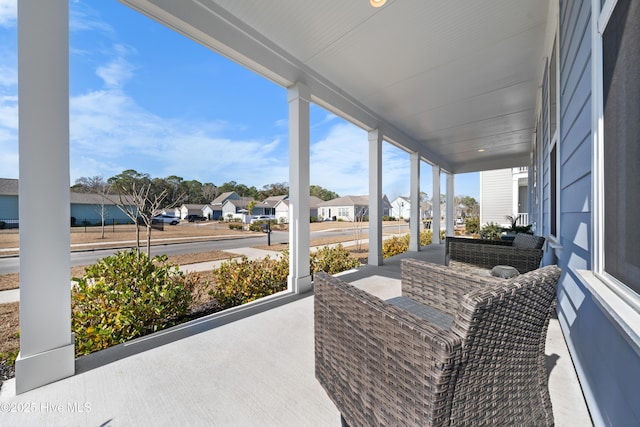 sunroom with a residential view