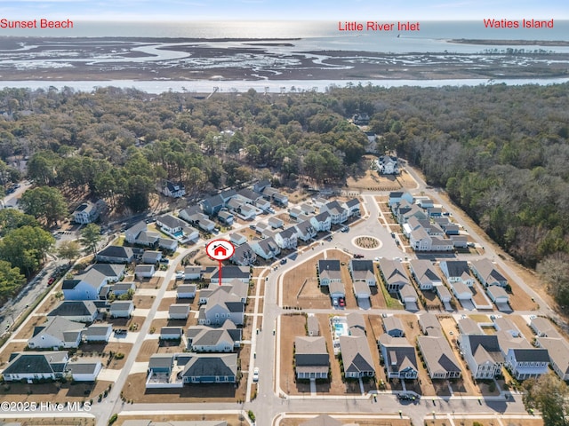 aerial view with a water view and a residential view