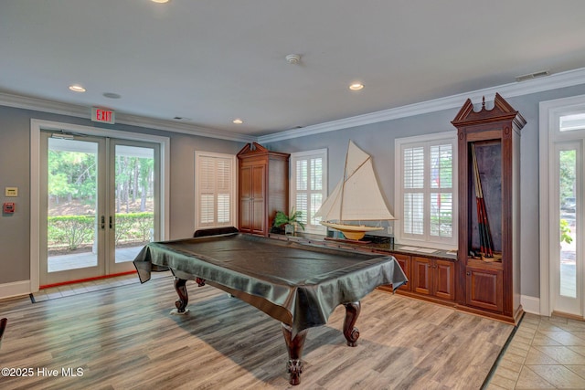 playroom with crown molding, light hardwood / wood-style flooring, pool table, and french doors