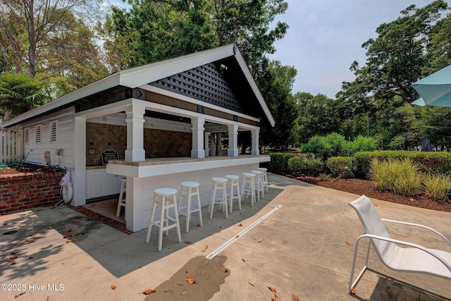 view of patio featuring a bar