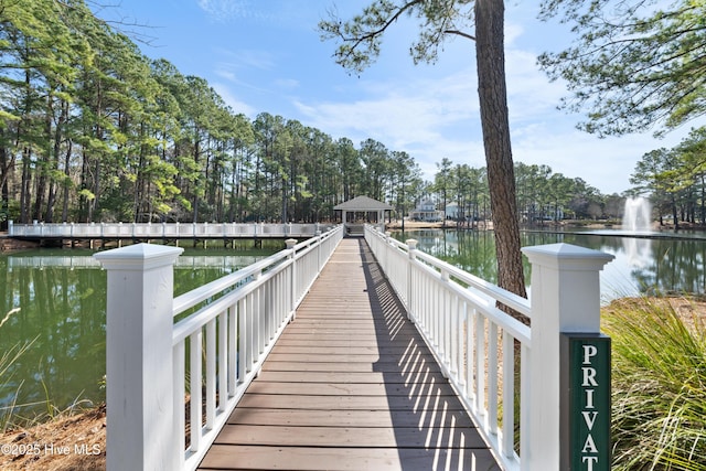 dock area featuring a water view and a gazebo