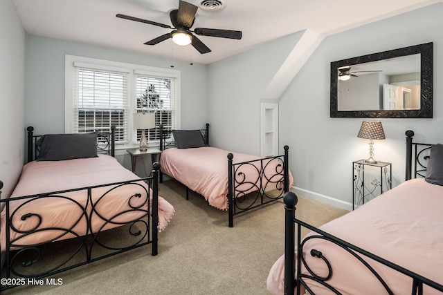 bedroom featuring light carpet and ceiling fan