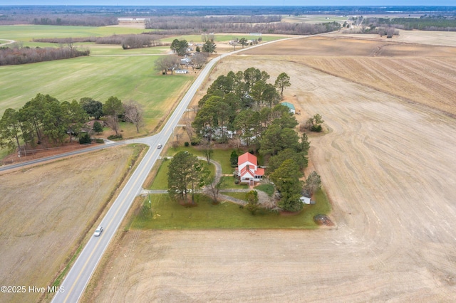 birds eye view of property featuring a rural view