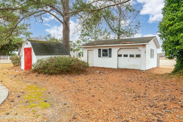 view of outbuilding with a garage