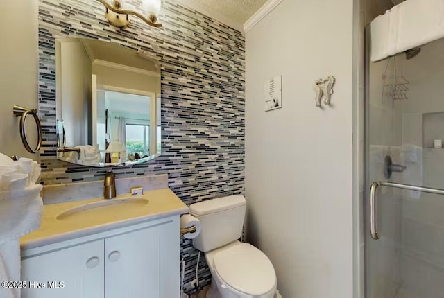 bathroom with tasteful backsplash, ornamental molding, vanity, and walk in shower