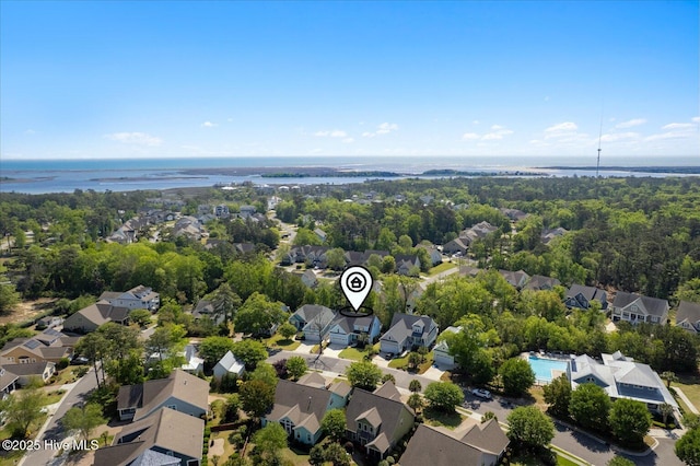 bird's eye view featuring a water view and a residential view
