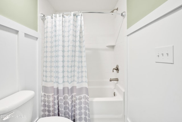 full bath featuring toilet and shower / bathtub combination with curtain