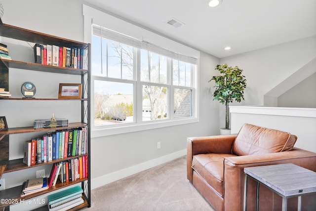 living area with baseboards, carpet flooring, visible vents, and recessed lighting