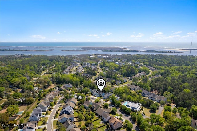 birds eye view of property featuring a water view and a residential view