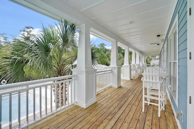 wooden deck featuring covered porch