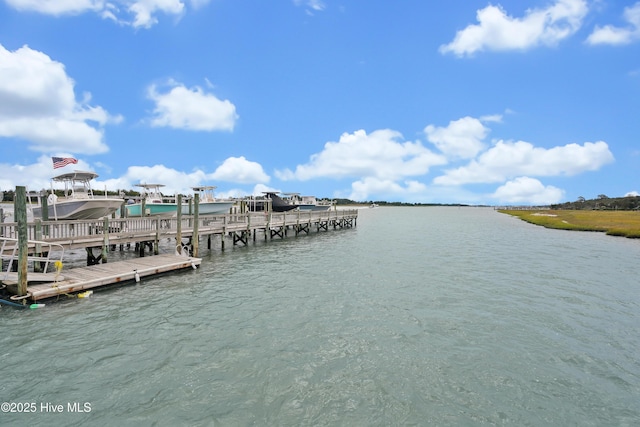 view of dock featuring a water view and boat lift