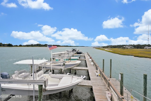 view of dock featuring a water view and boat lift