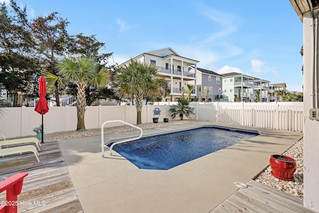 view of pool featuring a patio