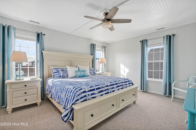 bedroom with light carpet and ceiling fan