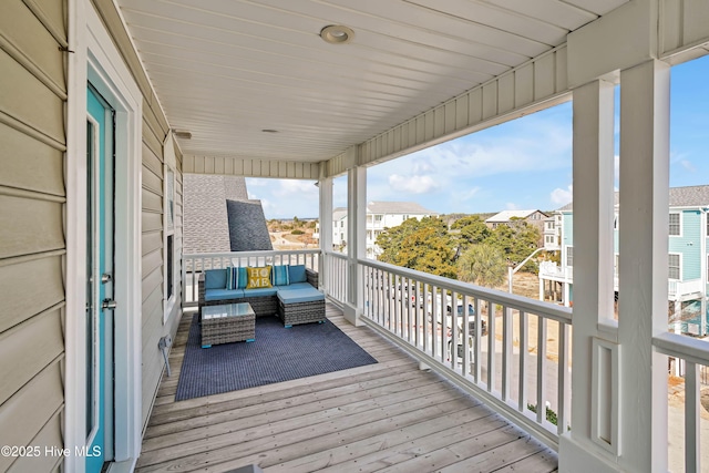 wooden deck featuring an outdoor hangout area