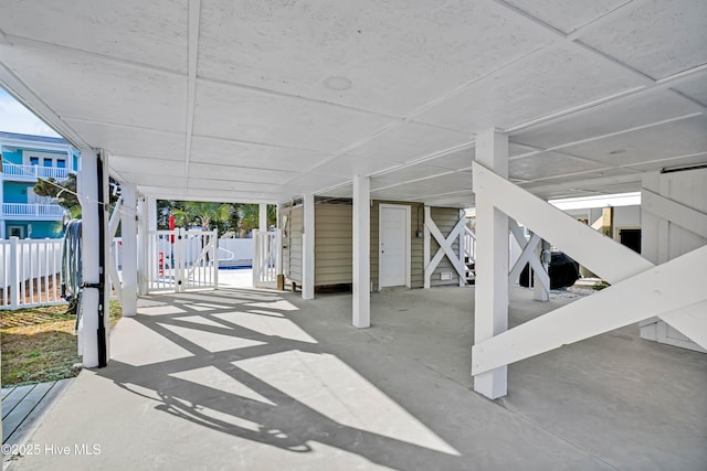 view of patio / terrace with a fenced in pool