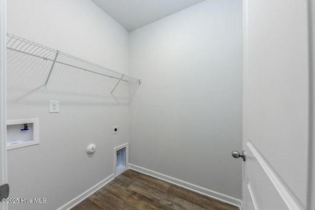 clothes washing area featuring electric dryer hookup, washer hookup, hookup for a gas dryer, and dark wood-type flooring