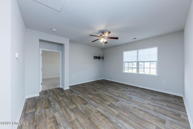 unfurnished room featuring hardwood / wood-style flooring and ceiling fan